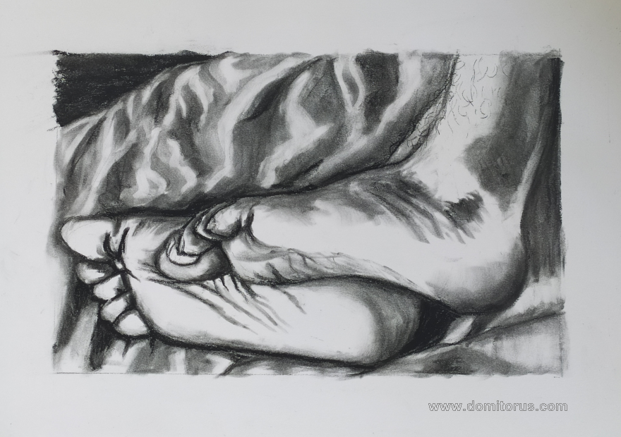 A charcoal-on-paper drawing of two feet resting on sheets