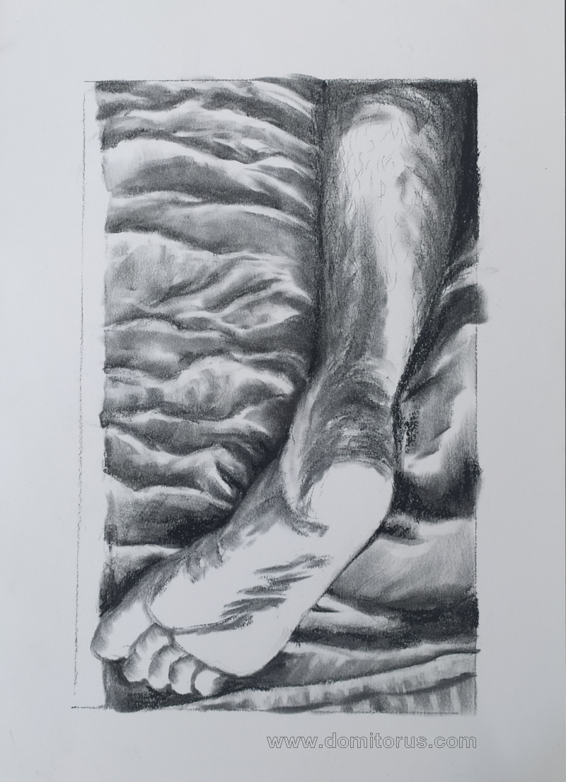 A charcoal-on-paper drawing of a right foot resting on sheets, sole upwards