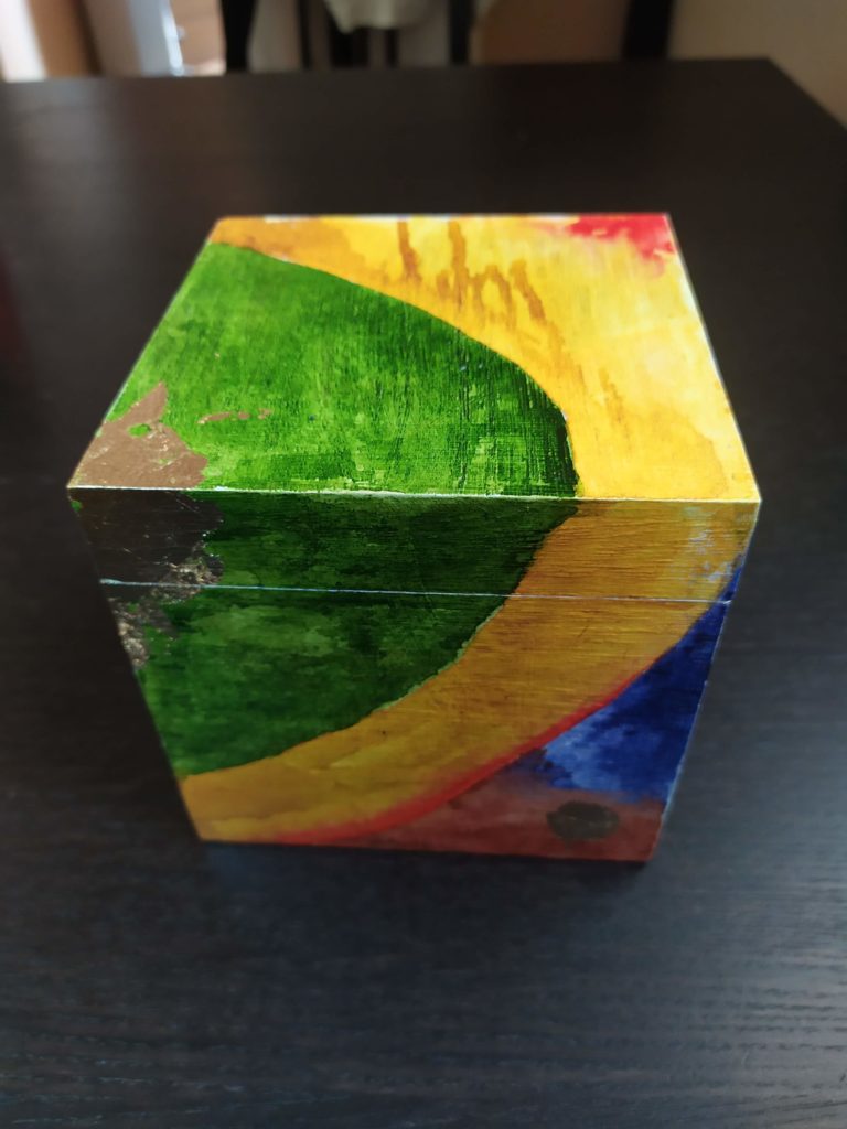 Box 06: wooden box decorated in coloured inks and gold leaf