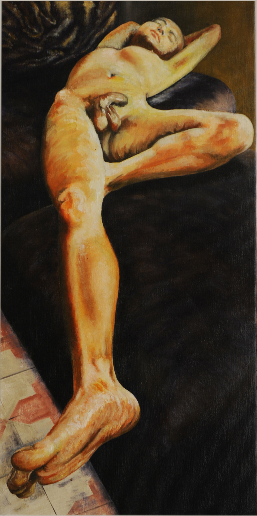 Oil painting of a young naked man, golden complexion, lying on a leather couch, seen from an extreme angle near his foot. The yellows and reds of his musculature contrast with the couch’s dark tones.