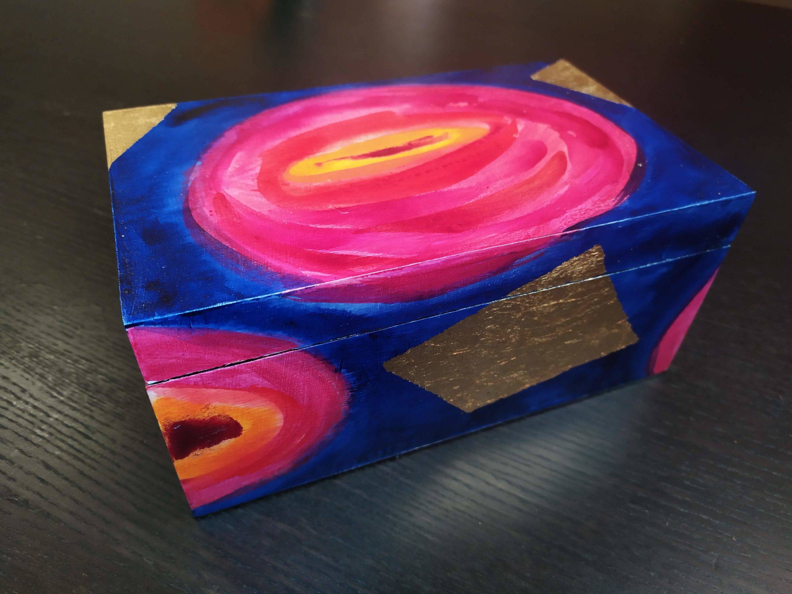 Box 02: wooden box decorated in coloured inks and gold leaf