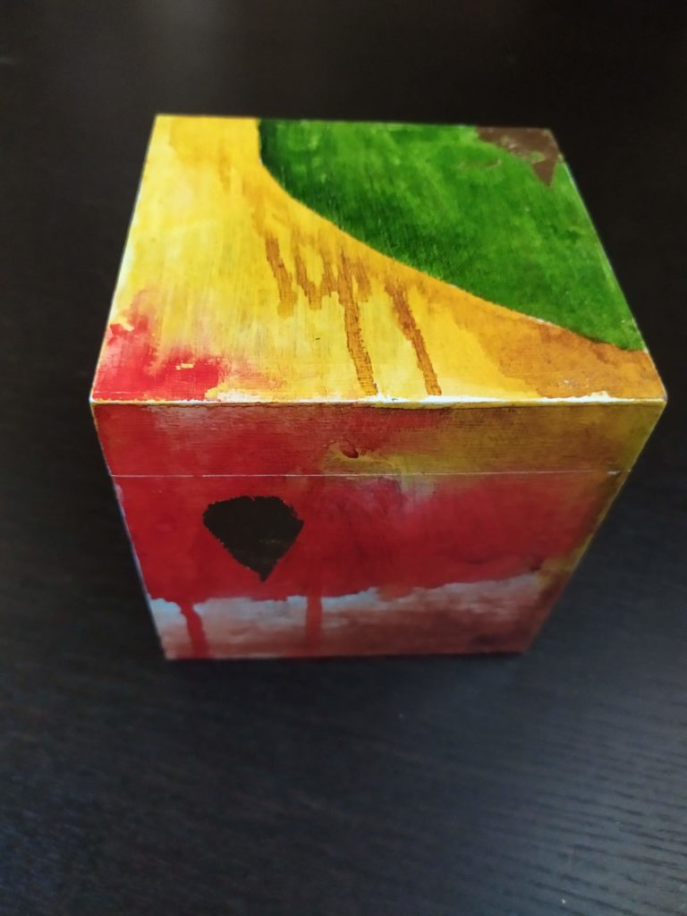 Box 06: wooden box decorated in coloured inks and gold leaf